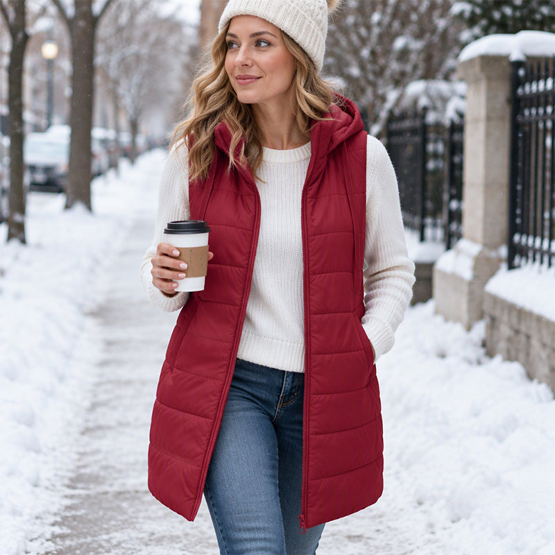 Gilet matelassé à capuche mi-long pour femme