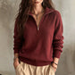 Pull femme décontracté à col demi-zippé et couleur unie