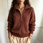 Pull femme décontracté à col demi-zippé et couleur unie